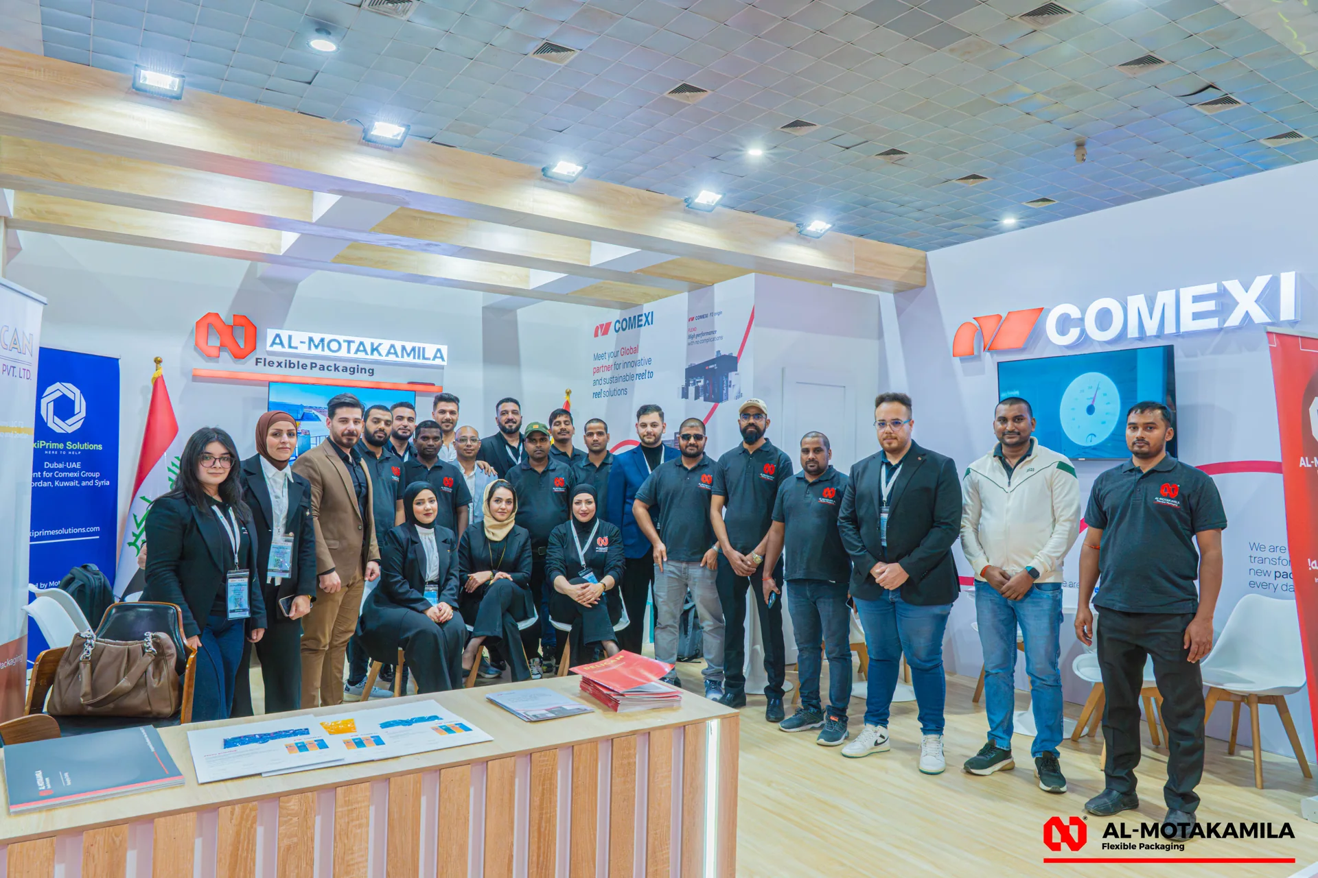 Almotakamila team at an exhibition